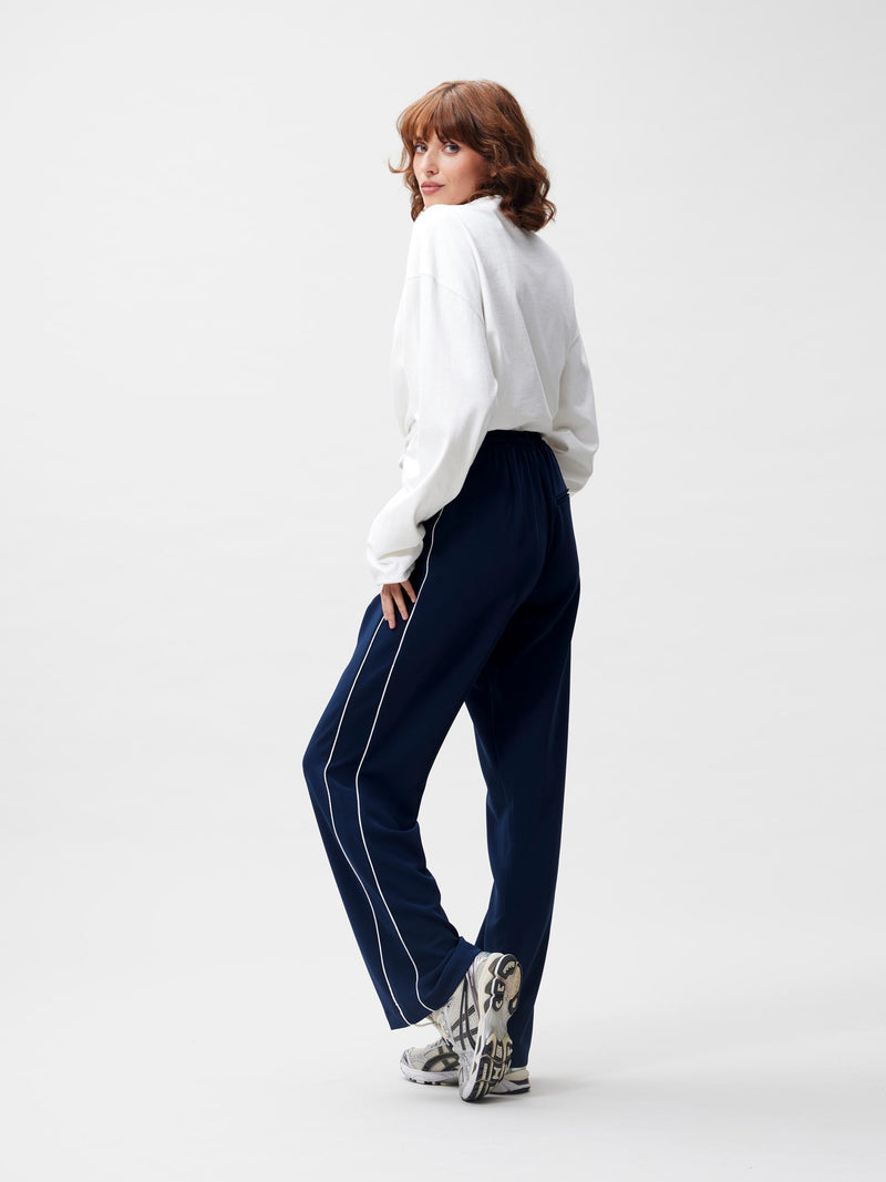 Tracksuit trousers with piping